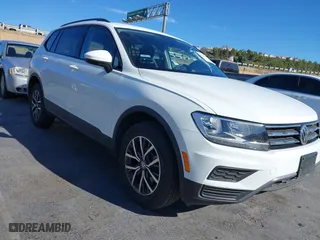 2021 Volkswagen Tiguan S with VIN 3VV1B7AX4MM097999, listed as a IAAI auction lot 41044805 with 22,602 mi miles. Bid and sale history available at carsss.com. Image 1.