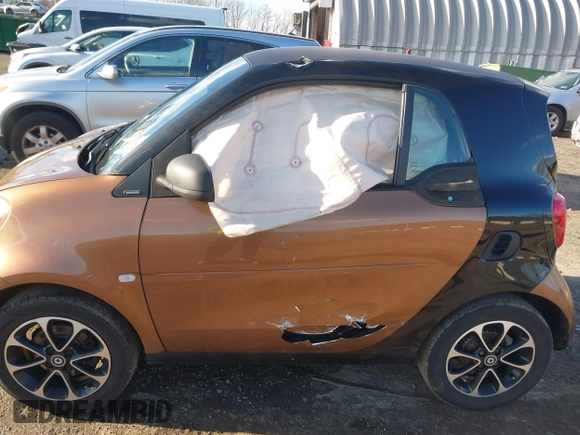 2016 Smart fortwo Passion with VIN WMEFJ5DA6GK079651, listed as a IAAI auction lot 41607293 with 146,753 mi miles and . Bid and sale history available at DreamBid. Image 6.
