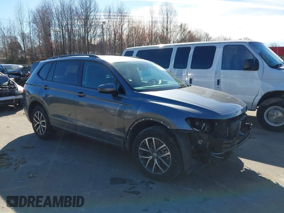 2021 Volkswagen Tiguan S with VIN 3VV1B7AX1MM044788, listed as a IAAI auction lot 41678069 with 91,665 mi miles and . Bid and sale history available at DreamBid. Image 1.