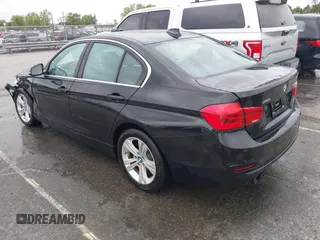 2018 BMW 3 Series 330i xDrive with VIN WBA8D9G50JNU69376, listed as a IAAI auction lot 41971138 with 61,551 mi miles. Bid and sale history available at carsss.com. Image 3.