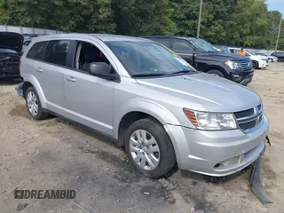 2014 Dodge Journey SE with VIN 3C4PDCAB7ET268221, listed as a IAAI auction lot 40262445 with 153,490 mi miles and . Bid and sale history available at carsss.com. Image 1.