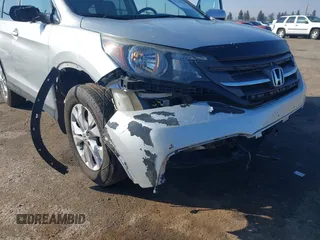 2013 Honda CR-V EX-L z VIN 2HKRM4H79DH658655, wystawiony jako IAAI lot #41243547 z przebiegiem 87 334 mil mil oraz . Historia ofert i sprzedaży dostępna na DreamBid. Obrazek 20.