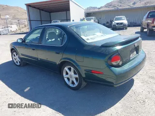 2000 Nissan Maxima GXE z VIN JN1CA31A8YT007617, wystawiony jako IAAI lot #42479039 z przebiegiem 165 950 mil mil oraz . Historia ofert i sprzedaży dostępna na DreamBid. Obrazek 3.