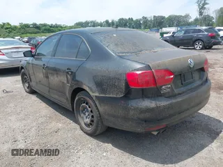 2014 Volkswagen Jetta SE with VIN 3VWD17AJ2EM392821, listed as a IAAI auction lot 42621085 with 102,211 mi miles and . Bid and sale history available at DreamBid. Image 3.