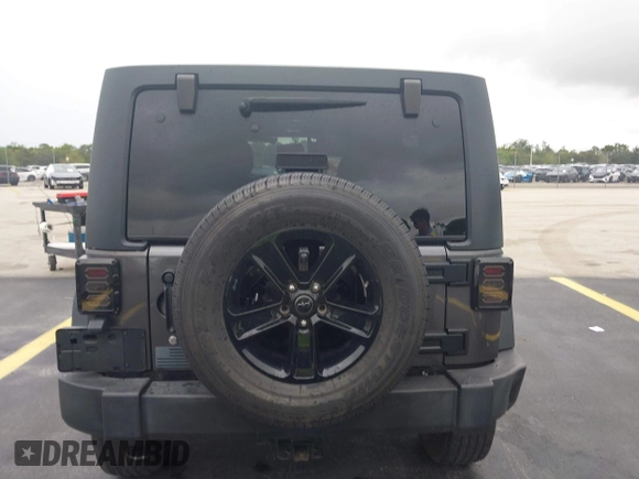 2018 Jeep Wrangler Unlimited Sport S with VIN 1C4BJWDG1JL810754, listed as a IAAI auction lot 42419199 with 74,901 mi miles and . Bid and sale history available at DreamBid. Image 16.