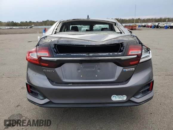 2018 Honda Clarity with VIN JHMZC5F19JC016997, listed as a Copart auction lot 46618465 with 90,038 mi miles and Salvage Title. Bid and sale history available at DreamBid. Image 6.