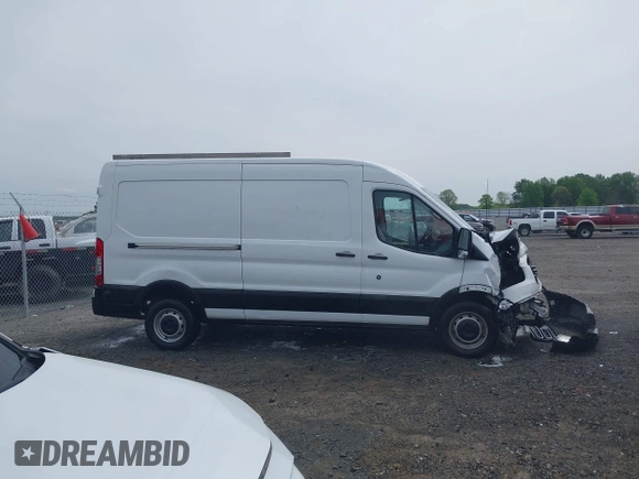 2018 Ford Transit z VIN 1FTYR2CM6JKA77870, wystawiony jako IAAI lot #42087185 z przebiegiem 142 452 mil mil oraz . Historia ofert i sprzedaży dostępna na DreamBid. Obrazek 13.