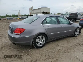 2005 Acura RL z VIN JH4KB16595C009988, wystawiony jako Copart lot #54700185 z przebiegiem 189 486 mil mil oraz Szkoda całkowita • Salvage title. Historia ofert i sprzedaży dostępna na DreamBid. Obrazek 3.