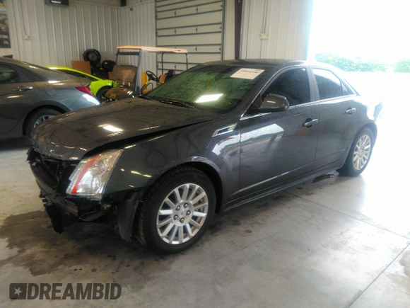 2013 Cadillac CTS Luxury with VIN 1G6DE5E54D0156491, listed as a IAAI auction lot 39844556 with 104,089 mi miles and . Bid and sale history available at DreamBid. Image 2.