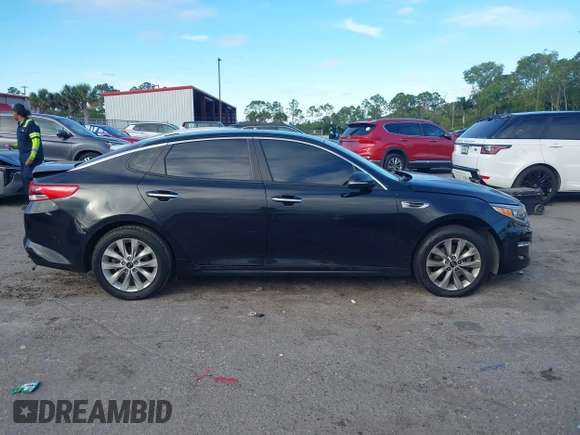 2018 Kia Optima LX with VIN 5XXGT4L38JG256924, listed as a IAAI auction lot 41267413 with 129,820 mi miles and . Bid and sale history available at DreamBid. Image 13.