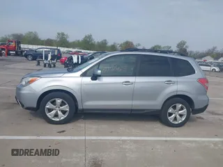 2014 Subaru Forester 2.5i Premium with VIN JF2SJAEC0EH516268, listed as a IAAI auction lot 42102665 with 162,561 mi miles. Bid and sale history available at carsss.com. Image 14.