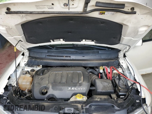 2013 Dodge Journey SXT with VIN 3C4PDDBG1DT521452, listed as a Copart auction lot 62660785 with 177,945 mi miles and Salvage title. Bid and sale history available at DreamBid. Image 12.
