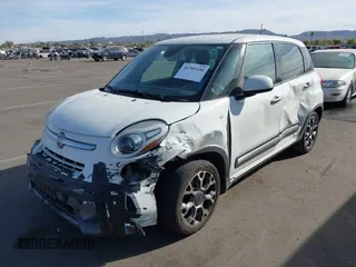 2014 FIAT 500L Trekking with VIN ZFBCFADH9EZ010937, listed as a IAAI auction lot 41385156 with 166,593 mi miles and . Bid and sale history available at DreamBid. Image 2.