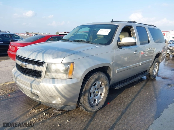 2008 Chevrolet Suburban LTZ with VIN 1GNFC16078J191766, listed as a IAAI auction lot 40743246 with 210,713 mi miles. Bid and sale history available at carsss.com. Image 2.