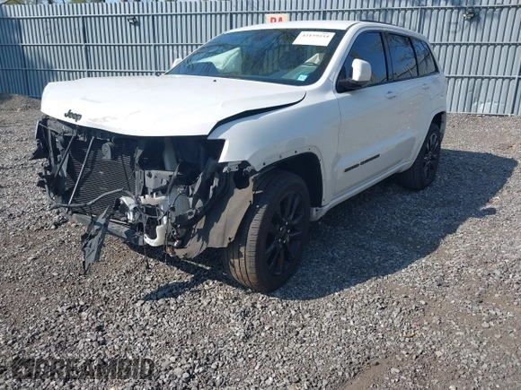 2018 Jeep Grand Cherokee Altitude with VIN 1C4RJFAG4JC309523, listed as a IAAI auction lot 42159534 with 86,682 mi miles and . Bid and sale history available at DreamBid. Image 2.