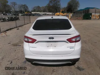 2016 Ford Fusion Titanium with VIN 3FA6P0K93GR331947, listed as a IAAI auction lot 41828409 with 181,555 mi miles and . Bid and sale history available at DreamBid. Image 16.