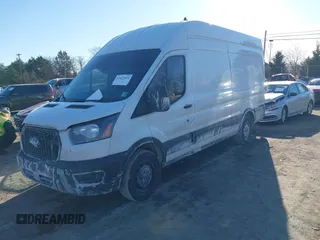 2021 Ford Transit Cargo with VIN 1FTBW3X82MKA14027, listed as a IAAI auction lot 41423524 with 121,221 mi miles. Bid and sale history available at carsss.com. Image 2.