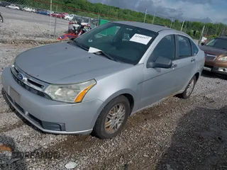 2010 Ford Focus SE with VIN 1FAHP3FN8AW282301, listed as a IAAI auction lot 42181977 with 295,992 mi miles and . Bid and sale history available at carsss.com. Image 2.