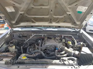 2004 Nissan Frontier XE z VIN 1N6ED27T54C427374, wystawiony jako IAAI lot #41712499 z przebiegiem 218 902 mil mil oraz . Historia ofert i sprzedaży dostępna na DreamBid. Obrazek 10.