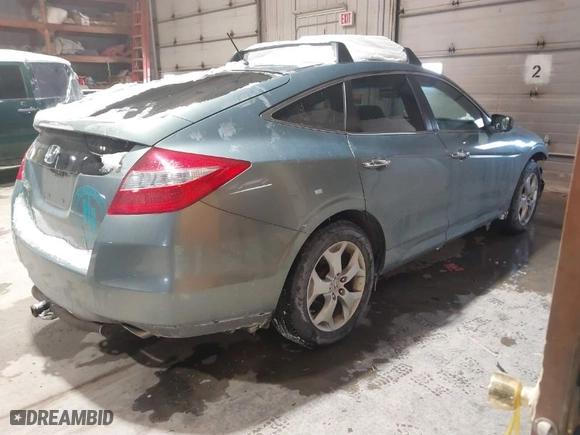 2010 Honda Accord Crosstour EX-L with VIN 5J6TF2H52AL015889, listed as a IAAI auction lot 41592337 with 203,357 mi miles. Bid and sale history available at carsss.com. Image 4.