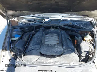 2004 Volkswagen Touareg with VIN WVGCM67L44D033856, listed as a IAAI auction lot 42142143 with 105,682 mi miles and . Bid and sale history available at DreamBid. Image 10.
