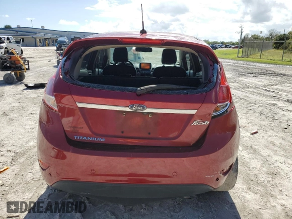 2017 Ford Fiesta Titanium with VIN 3FADP4FJXHM171163, listed as a Copart auction lot 77911114 with 80,171 mi miles and Salvage Title. Bid and sale history available at DreamBid. Image 6.