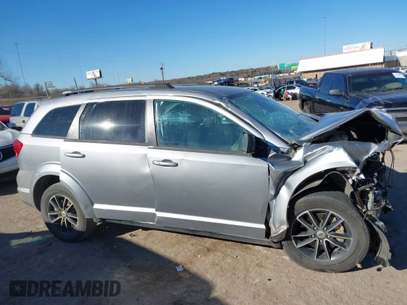 2019 Dodge Journey SE with VIN 3C4PDCBB6KT738488, listed as a IAAI auction lot 41330395 with Not Provided miles and . Bid and sale history available at DreamBid. Image 14.