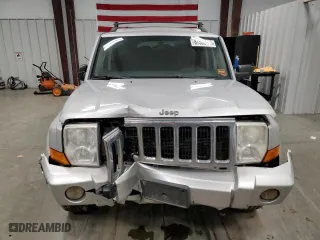 2010 Jeep Commander Sport with VIN 1J4RG4GK2AC127697, listed as a Copart auction lot 87582415 with 204,676 mi miles and Salvage Title. Bid and sale history available at carsss.com. Image 5.