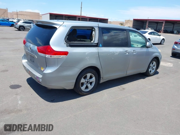 2011 Toyota Sienna LE AAS with VIN 5TDKK3DC0BS040975, listed as a IAAI auction lot 42639431 with 430,456 mi miles and . Bid and sale history available at DreamBid. Image 4.
