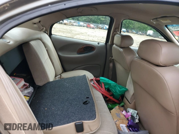 1999 Mercury Sable LS with VIN 1MEFM53U6XG646248, listed as a Copart auction lot 57859405 with 128,286 mi miles and Salvage title. Bid and sale history available at DreamBid. Image 10.