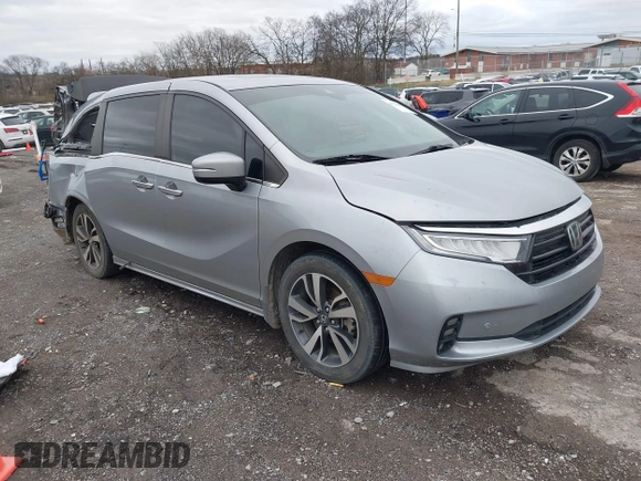 2021 Honda Odyssey Touring with VIN 5FNRL6H82MB009480, listed as a IAAI auction lot 41728056 with 84,577 mi miles. Bid and sale history available at carsss.com. Image 1.