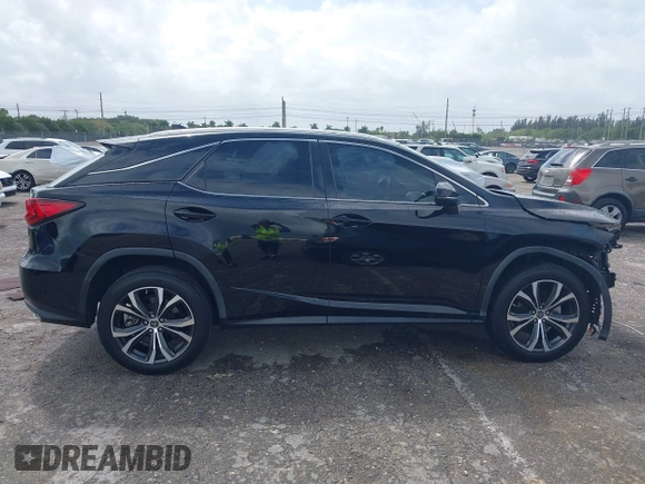 2020 Lexus RX 350 with VIN 2T2HZMAA9LC153571, listed as a IAAI auction lot 41710981 with 34,354 mi miles and . Bid and sale history available at DreamBid. Image 13.