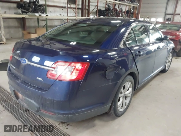2011 Ford Taurus SEL with VIN 1FAHP2EW7BG174493, listed as a IAAI auction lot 41697856 with 143,957 mi miles. Bid and sale history available at carsss.com. Image 4.