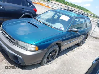 1997 Subaru Legacy Outback z VIN 4S3BG6859V6613083, wystawiony jako IAAI lot #42623719 z przebiegiem 150 558 mil mil oraz . Historia ofert i sprzedaży dostępna na DreamBid. Obrazek 2.