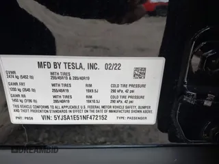 2022 Tesla Model S with VIN 5YJSA1E51NF472152, listed as a IAAI auction lot 42625943 with 60,290 mi miles and . Bid and sale history available at DreamBid. Image 9.