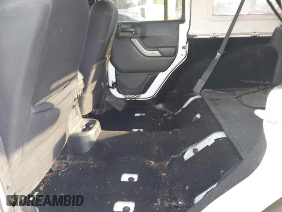 2013 Jeep Wrangler Unlimited Sport RHD with VIN 1C4BJWKG2DL642078, listed as a IAAI auction lot 42134649 with Not provided miles and . Bid and sale history available at DreamBid. Image 8.