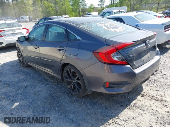 2019 Honda Civic Sport with VIN 2HGFC2F8XKH598141, listed as a IAAI auction lot 42013724 with 98,401 mi miles and . Bid and sale history available at DreamBid. Image 3.
