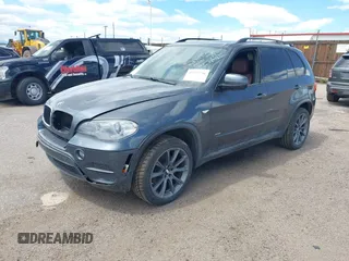 2012 BMW X5 35i z VIN 5UXZV4C53CL987556, wystawiony jako IAAI lot #42297756 z przebiegiem 190 922 mil mil oraz . Historia ofert i sprzedaży dostępna na DreamBid. Obrazek 2.