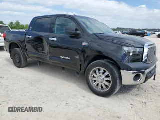 2012 Toyota Tundra 4WD Truck with VIN 5TFDW5F16CX247953, listed as a Copart auction lot 52457445 with 215,411 mi miles and Salvage Title. Bid and sale history available at carsss.com. Image 4.