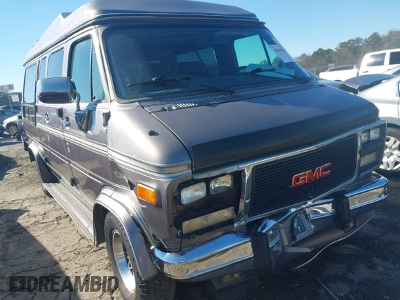 1993 GMC Vandura z VIN 1GDEG25KXPF515274, wystawiony jako IAAI lot #41663966 z przebiegiem 112 288 mil mil oraz . Historia ofert i sprzedaży dostępna na DreamBid. Obrazek 6.
