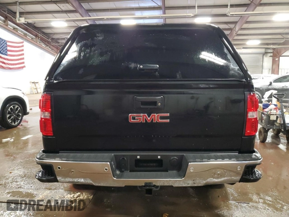 2015 GMC Sierra 1500 SLT with VIN 3GTU2VEJXFG517420, listed as a Copart auction lot 42144385 with 122,446 mi miles and Clean Title. Bid and sale history available at DreamBid. Image 6.