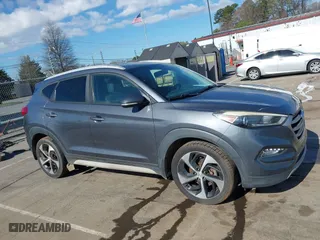 2017 Hyundai Tucson Value with VIN KM8J33A25HU402366, listed as a IAAI auction lot 41814426 with 117,669 mi miles. Bid and sale history available at carsss.com. Image 13.