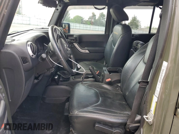 2015 Jeep Wrangler Unlimited Wrangler X with VIN 1C4BJWEG4FL754492, listed as a Copart auction lot 55305825 with 108,078 mi miles and Salvage title. Bid and sale history available at DreamBid. Image 7.