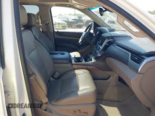 2015 Chevrolet Tahoe LTZ z VIN 1GNSKCKC7FR115444, wystawiony jako IAAI lot #42113903 z przebiegiem 162 383 mil mil oraz . Historia ofert i sprzedaży dostępna na DreamBid. Obrazek 5.