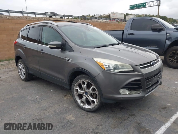 2013 Ford Escape Titanium with VIN 1FMCU0J95DUC71130, listed as a IAAI auction lot 42072032 with 144,054 mi miles and . Bid and sale history available at carsss.com. Image 1.