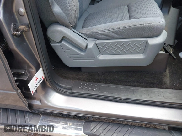 2013 Ford F-150 XL with VIN 1FTFW1CF8DKG49540, listed as a IAAI auction lot 42386031 with 151,073 mi miles and . Bid and sale history available at DreamBid. Image 14.