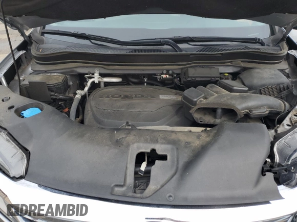 2019 Honda Pilot Touring 8-Passenger z VIN 5FNYF5H91KB033661, wystawiony jako Copart lot #56650155 z przebiegiem 73 512 mil mil oraz Szkoda całkowita • Salvage title. Historia ofert i sprzedaży dostępna na DreamBid. Obrazek 12.