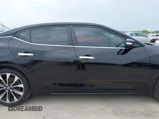 2016 Nissan Maxima SV z VIN 1N4AA6AP2GC376472, wystawiony jako IAAI lot #42115734 z przebiegiem 98 432 mil mil oraz . Historia ofert i sprzedaży dostępna na DreamBid. Obrazek 13.