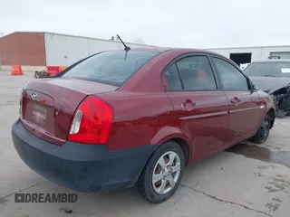 2007 Hyundai Accent GLS with VIN KMHCN46C57U108605, listed as a IAAI auction lot 41932061 with 195,580 mi miles. Bid and sale history available at carsss.com. Image 4.