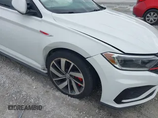 2020 Volkswagen Jetta GLI S with VIN 3VW6T7BU8LM058477, listed as a IAAI auction lot 41504769 with 121,419 mi miles and . Bid and sale history available at DreamBid. Image 6.
